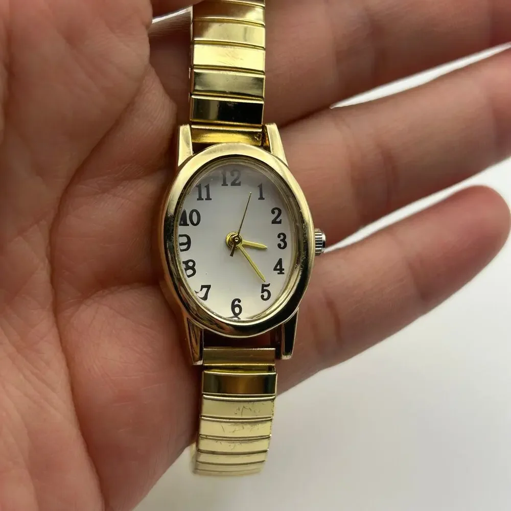 Gold-tone Oval Case Stainless Steel Stretch Band Women’s Watch Working